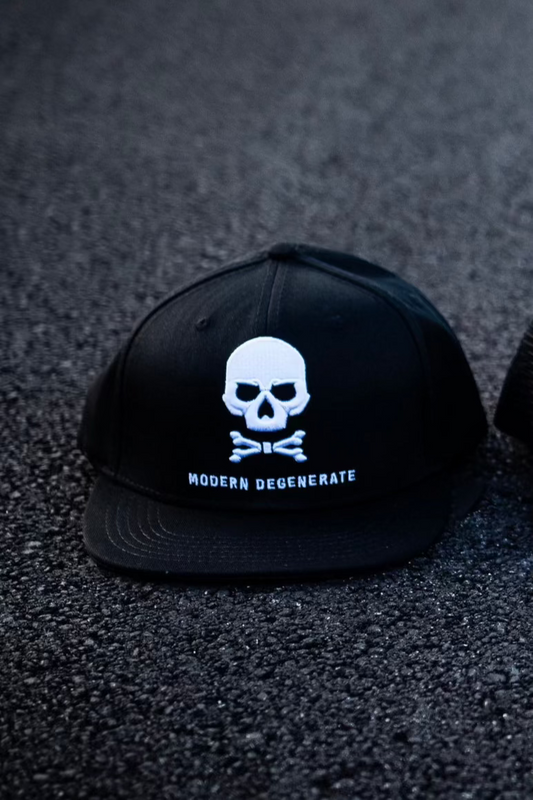 A black polyester flat brim hat with a skull on it